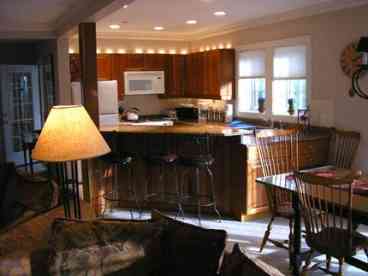 Kitchen area of open plan Stowe rental resort home mountain views