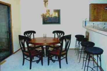 Dining Room, left to deck and woods, right is the kitchen