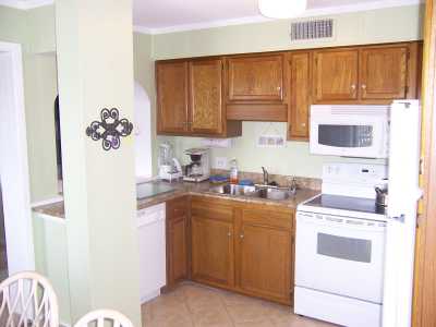 Our fully furnished kitchen has refrigerator, stove/range, dishwasher, microwave, and coffee maker