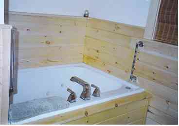 Relax in the Jacuzzi Whirlpool tub with built in heater