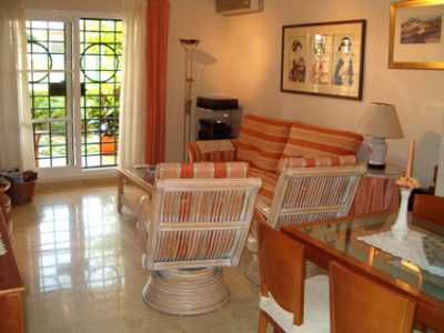 Lounge/Dining area: Good sized open-plan lounge/diner with patio doors to the private garden, furnished with a dining table and 6 chairs, a sofa and 2 chairs and colour TV. 

