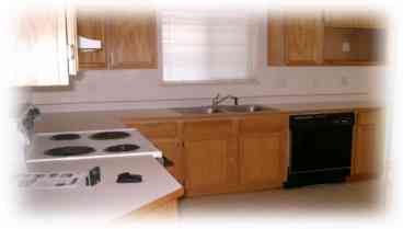 Your kitchen is loaded with cooking utensils, pots, pans, side-by-side fridge with in-door ice maker and water 