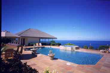 Outdoor facilities include a temperature controlled swimming pool and twelve person jacuzzi situated in the perfect spot to relax with a cocktail and watch a Hawaiian sunset over the Pacific Ocean.