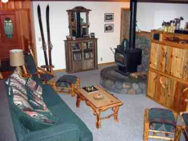 The woodstove makes this room a warm and cozy place