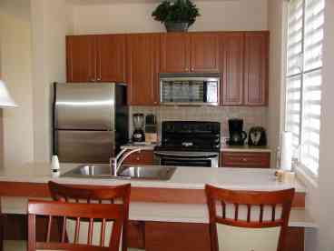 Kitchen complete w/full size appliances, refrigerator w/icemaker, filtered water, microwave, blender, toaster, coffemaker, electric stove, dishwasher and all cookware, dishes and utensils needed for your meal preparation.