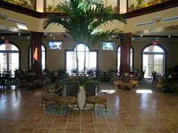 The 17,000 sq ft clubhouse features a full restaurant,  Sports bar with Large plasma TV, Tiki bar