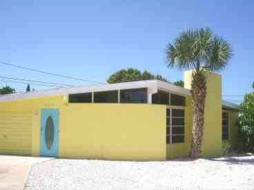 Vacation homes features heated pool and is walking distance to the beach