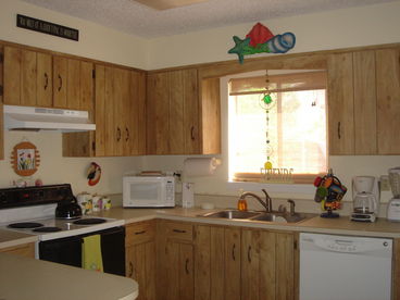 Kitchen is updated with newer appliances  and is truly a cook\'s delight!   