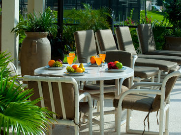 The perfect place to escape the morning sun with coofee or a juice and relax under the cooling fans with some light music