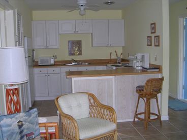You can entertain and prepare the meals with this open kitchen design.