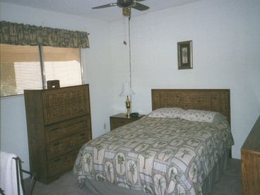 Master bedroom with queen size bed..