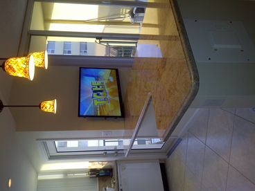 View of sliding glass doors to balcony from dining room