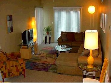 Spacious, Bright and Airy Living Room, Plenty of Seating for All, Vaulted Ceilings, Air Conditioning Throughout, Ceiling Fans, Cable TV, Wireless DSL Internet