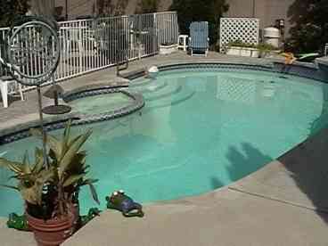 Private, fenced backyard swimming pool and spa.  Pool heating available.
