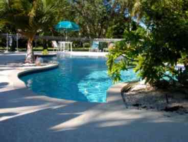 Our 40ft Lagoon Style Swimming Pool is the perfect place to cool off after a day of fishing, SCUBA Diving.  Or just kick back and have fun by the tropical scenery.
