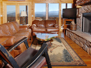 Pigeon Forge Cabin Rental- A View to Remember has a panoramic mountain view from the deck of this Four Bedroom Luxury Cabin Rental