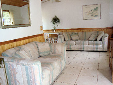 seating areas. One of the sofa is a pull-out sleeper sofa