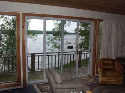 Looking out front slider. This is the view from every room in the cottage. Only 50\' from the waters edge.
