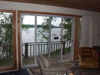 Looking out front slider. This is the view from every room in the cottage. Only 50\' from the waters edge.
