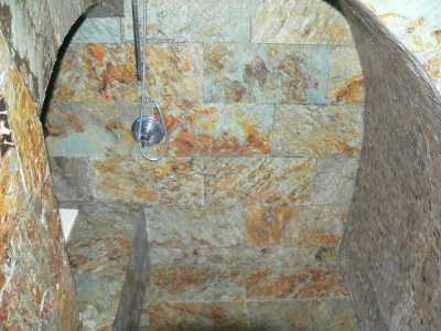 SLATE SHOWER WITH SOAKING TUB TO THE LEFT