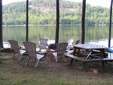 Seating by the lake and fire pit