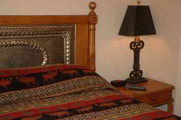 Details of fine furnishings in master bedroom. 