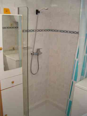 Shower Room: with shower, toilet, wash basin and washing machine. 

