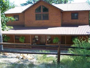Chulosa is �Peace� in the Choctaw language.

When you arrive at Chulosa you�ll immediately sense the distinctive balance of this majestic peaceful giant. 

The ground floor of Chulosa offers a grand entrance; solid wood door, lobby vestibule and spectacular living/dining area accented with towering windows that overlook the forest.  The d�cor of Chulosa is rich in style and features a renaissance century dining table accented with a sensational branched chandelier.  �Awesome, a must see.�

