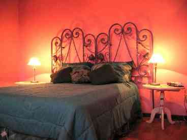 Ajijic Vacation Rental Romantic Master Bedroom with King size bed and lake views from this vacation rental home in Ajijic.