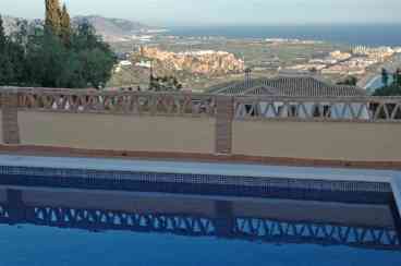 View over pool to sea & Moorish castle.