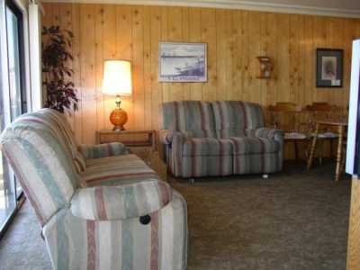 Living room couch & loveseat, both have recliners.