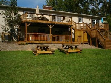 Our home overlooks our own private stream-fed pond known as White Stone Lake on 2 beautiful acres right in town.