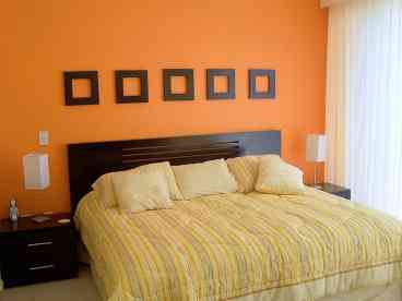 Elegant master bedrooms with high quality linens and ocean view