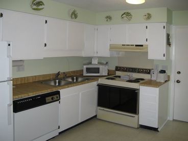 Kitchen Area w/ New Frig and Washer/Dryer