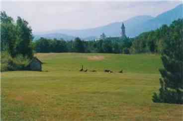 The view  of Monastery/lake/chain of mountains from inside the cottage