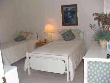 Twin Beds with large walk-in closet. 