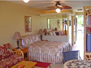 Living area with a queen bed and queen sleeper sofa