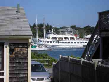 Look at the large living room window to catch a view of the harbor