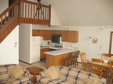 Main Floor, Kitchen, Dining area, and Living room. Stairs lead to Master Bedroom in the Loft