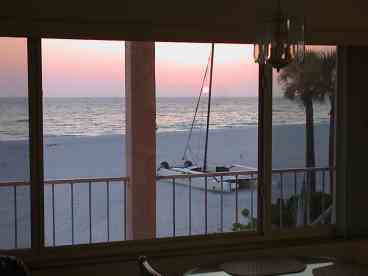 Enjoy beautiful sunsets and beach views of the Gulf of Mexico from the front window of the Florida vacation rental.