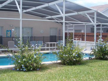 The swimming pool and garden are fenced in for total privacy