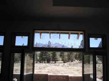 Custom window looking towards mountains