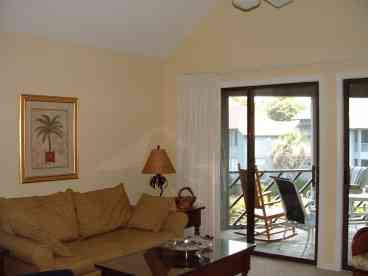 living area with view to screened deck and lagoon