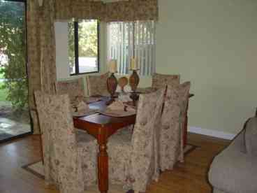 With wine chiller, slidder door right out to the back patio area complete with BBQ, table and chairs.