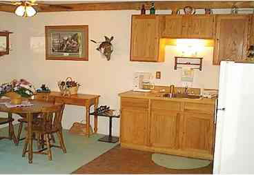 To the left of this photo are two sets of French doors, that allow you to walk out & view the valley below.
Our guest quarters has its own private entrance & we respect your privacy. If you want directions for back road adventures in the National Forest to enjoy your picnic lunches, just ask!