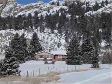 Nestled at the base of historic Calamity Peak east of Custer, this welcoming and relaxing ranch home provides a welcome you'll look forward to coming back to!