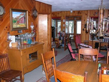 View over dining area shows access to the lakeside porch