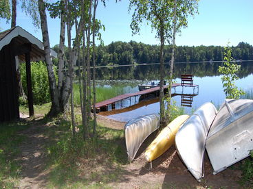 Waterfront area with safe swimming and sandy beach. Canoes, kayak, and rowboat available for free use. Fishing boat with outboard and trolling motor for minimal fee.