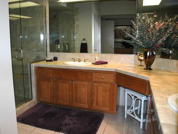 Beautiful master bath with cherry cabinets and oversized walk in shower with sea