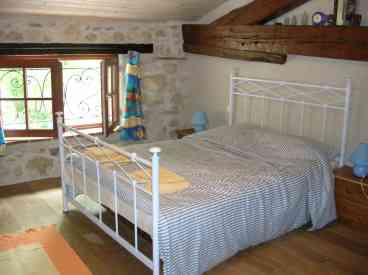 A beautiful big double room showing off the lovely oak beams and white stone walls. This room has a large ensuite shower room with walk in shower.